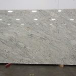 white kitchen with white granite countertops
